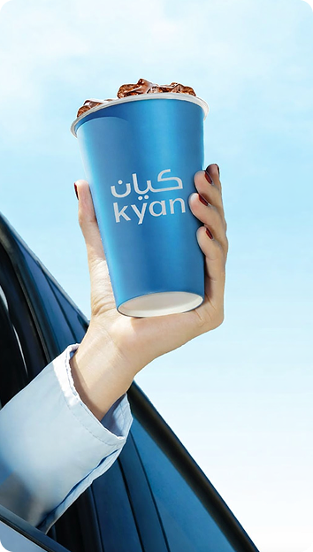Kyan cup held out of car window
